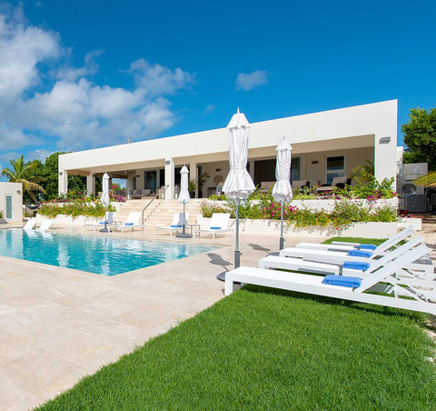 14 Must Have Outdoor Furniture Pieces and Accents for Your Poolside Oasis